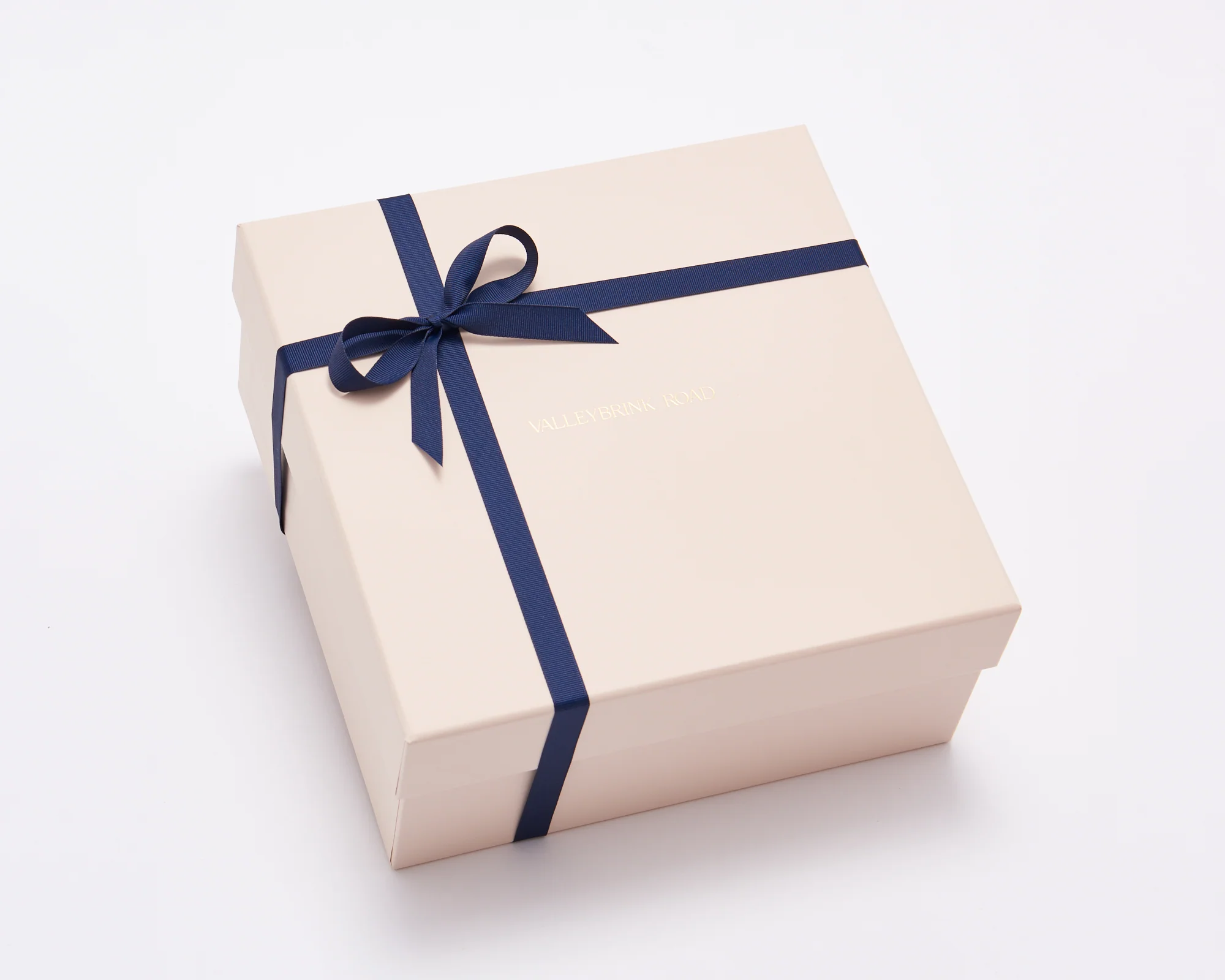 Gift box tied with a blue ribbon